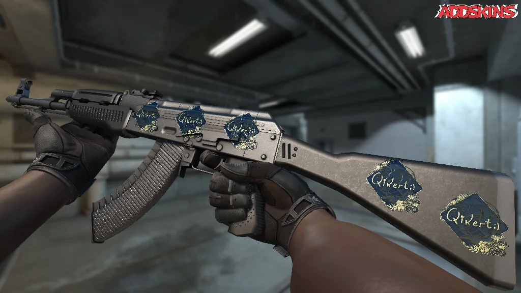 Sticker | qikert (Gold) | Rio 2022 inspecting