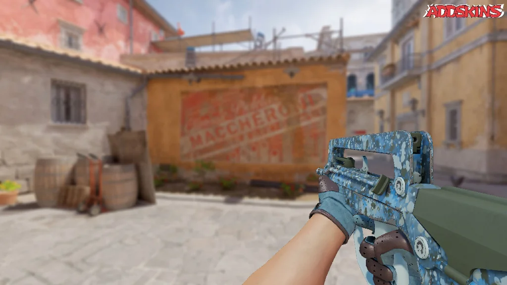 FAMAS | Cyanospatter holding