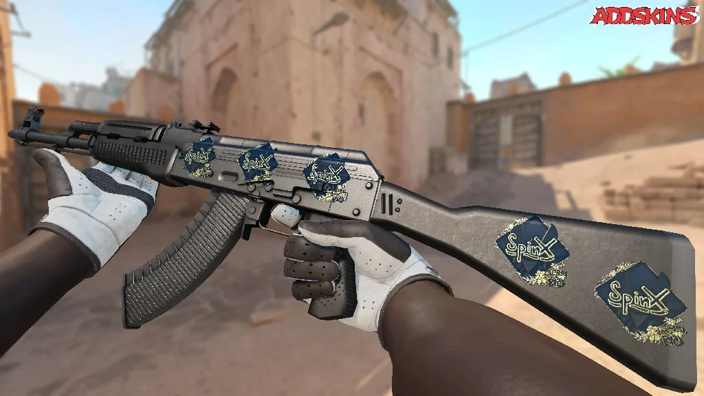 Sticker | Spinx (Gold) | Rio 2022 inspecting